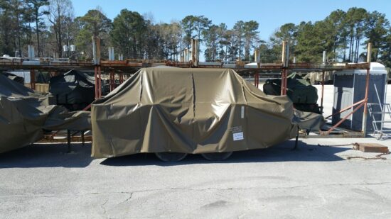 Military equipment covered for outdoor storage