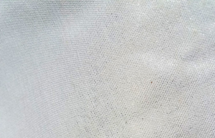 Close up of polycotton side of scrim foil moisture barrier bag