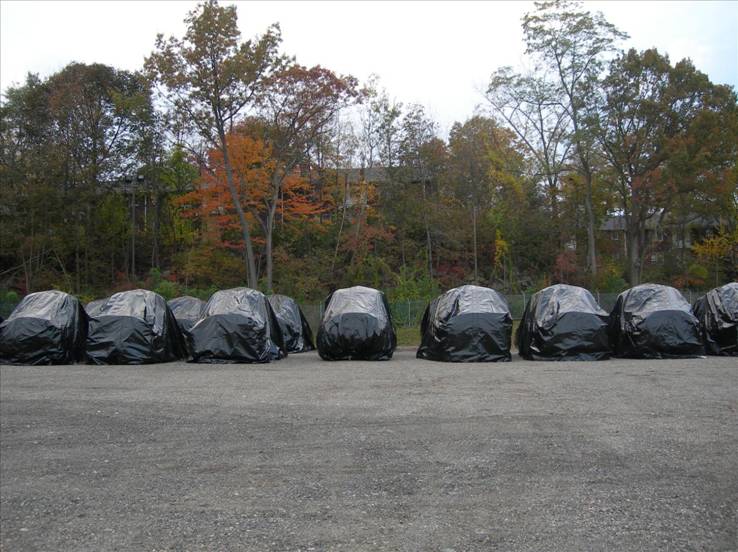 ARNG Trucks Packaged for Long-Term  Outdoor Storage