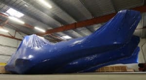 Helicopter cocooned in an AirProPak preservation kit