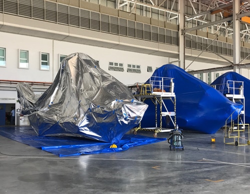 helicopter preservation solution - helicopters packaged in moisture barrier materials - covers for helicopters